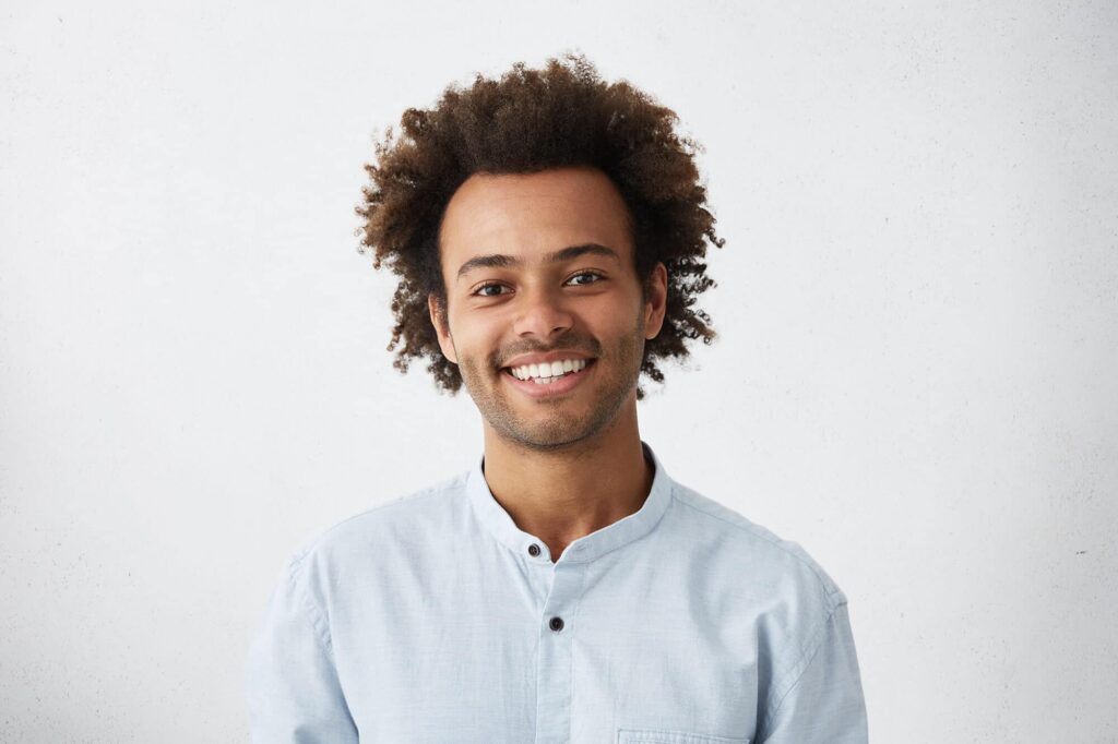 cheerful african guy with narrow dark eyes and flu 2021 08 30 23 09 18 utc